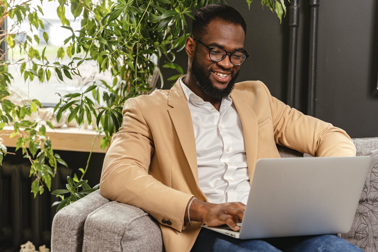 Person using a laptop to sign up for Stocko Affiliate Program