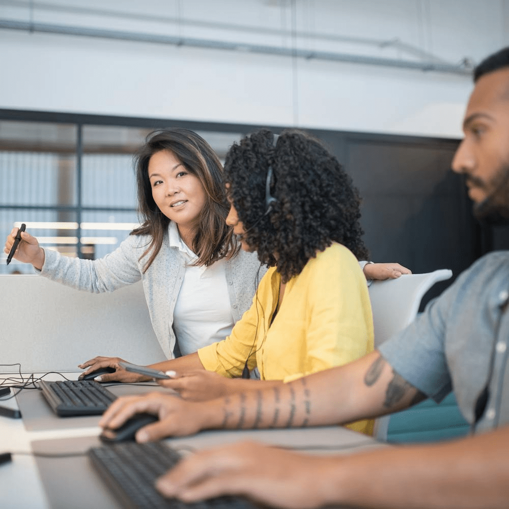 Stocko's customer support team collaborating to empower businesses